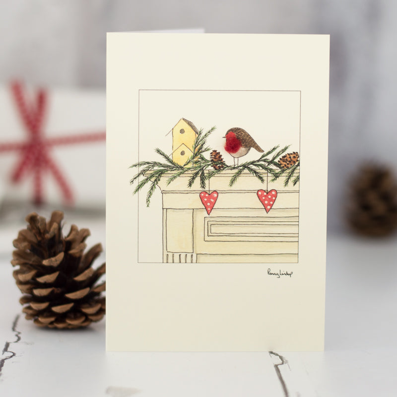 Robin on a mantlepiece Christmas card