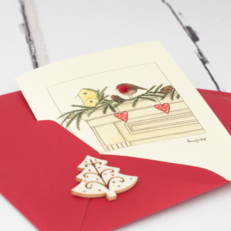 Robin on a mantlepiece Christmas card