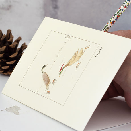 Ducks skating Christmas card