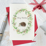 Hedgehog and wreath Christmas card