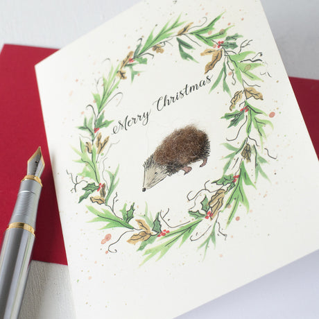 Hedgehog and wreath Christmas card