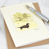 Dachshund In The Countryside greetings card