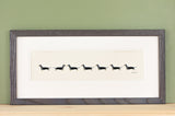 Dachshunds -  Long row of Dachshunds print
