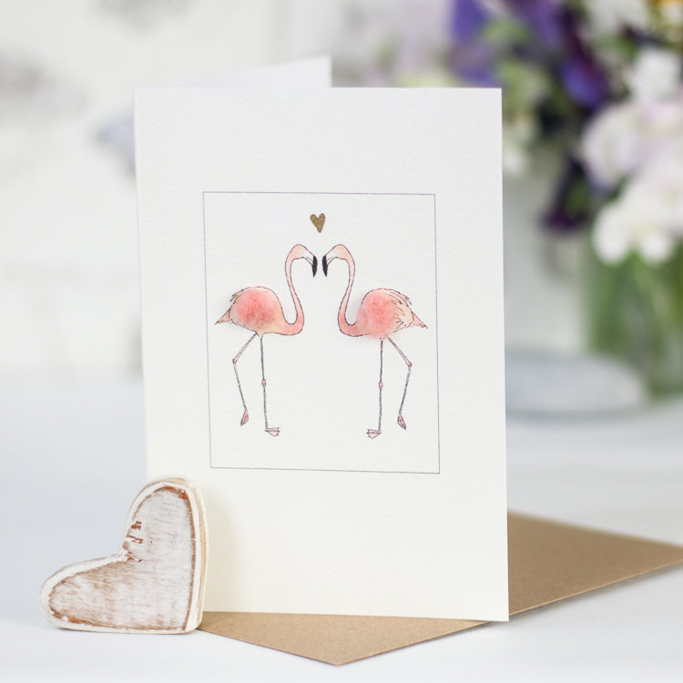 Flamingos and heart greetings card